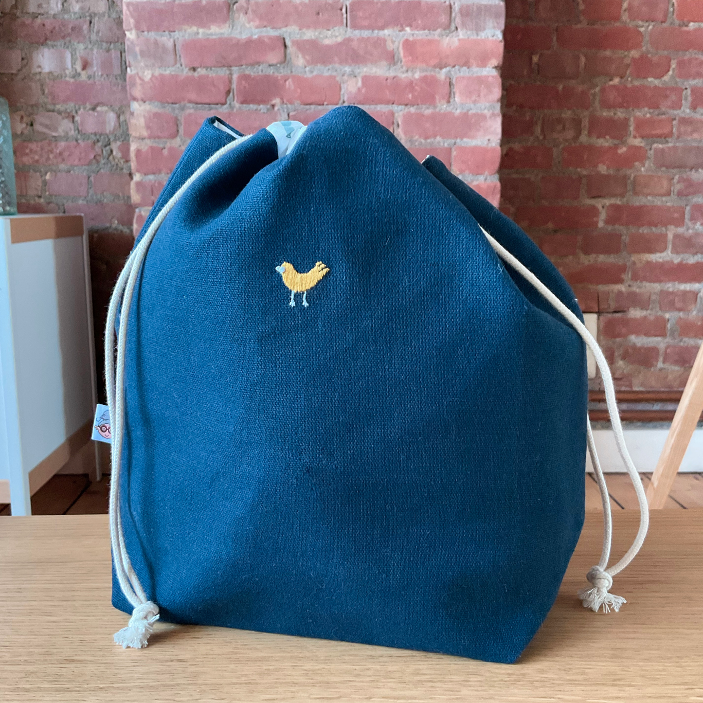 Geborduurde project bag - gele vogel - medium